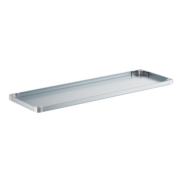 A silver rectangular galvanized steel shelf with metal corners.