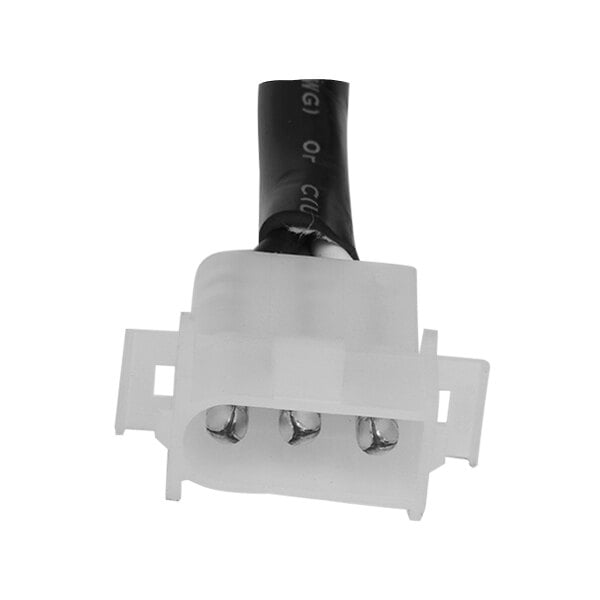The white connector with two wires on a Hartell drop-in replacement ice machine pump.