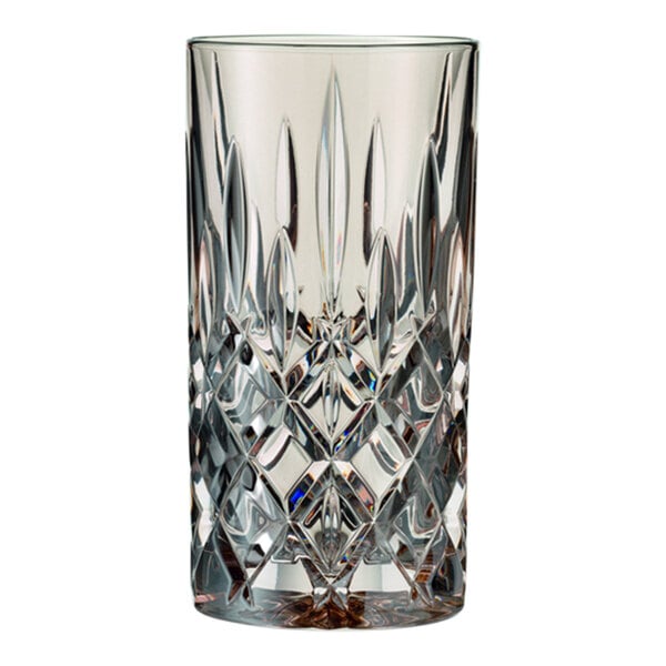 A close-up of a Nachtmann Noblesse crystal glass with a diamond pattern.