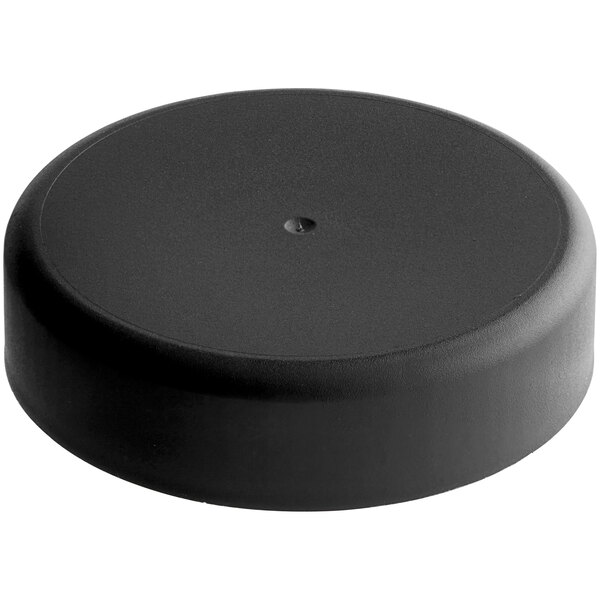 A 53/400 black circular plastic cap with a dot on the top.