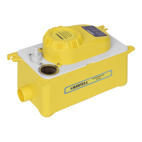 A yellow and white Hartell condensate pump with a round cap.