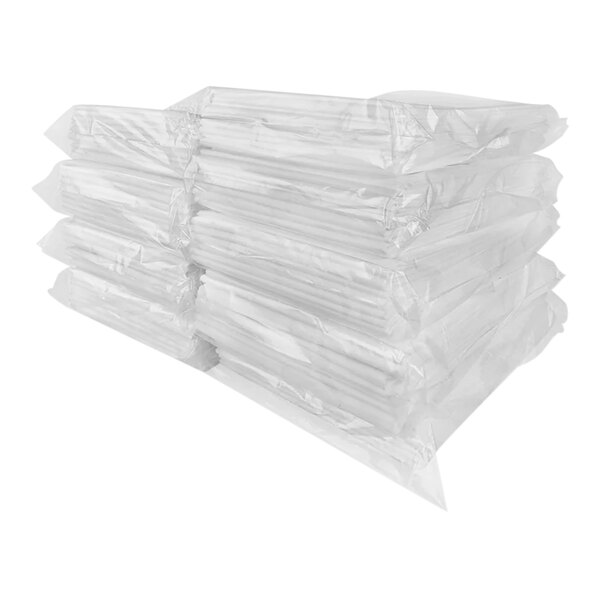 A stack of clear plastic Quick Dam absorbent drip mats.