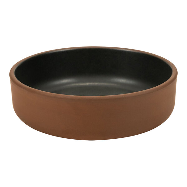 A brown stoneware bowl with a black rim.