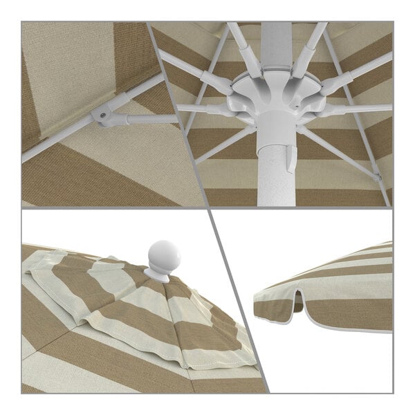 A close-up of a California Umbrella with a white pole and striped Sunbrella canopy.