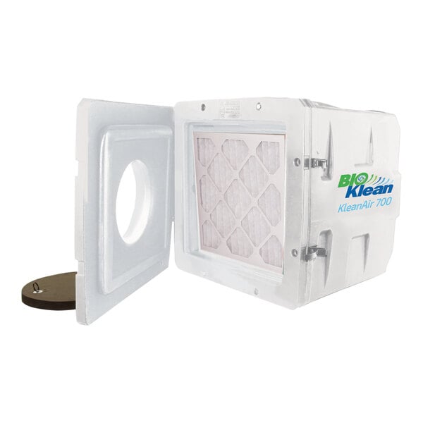 A white box with a hole and a filter inside.