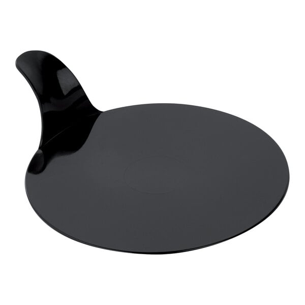 A black circular Pavoni pastry display with a curved edge.