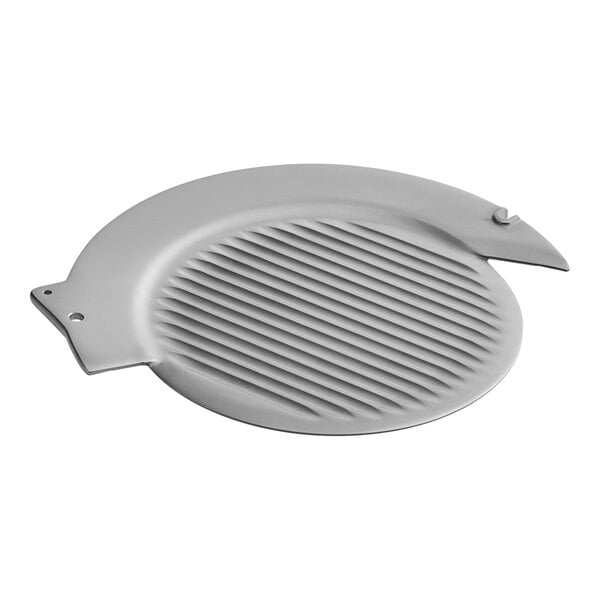 A grey round grill with a hole in the middle.