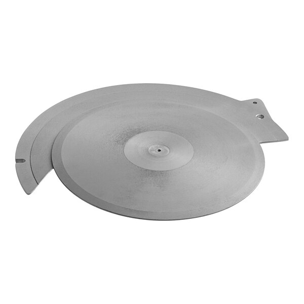 A silver circular blade cover for a meat slicer with a circular hole in the middle.