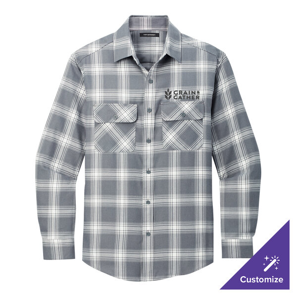 A Port Authority long sleeve plaid flannel shirt in gray and cream with a pocket.
