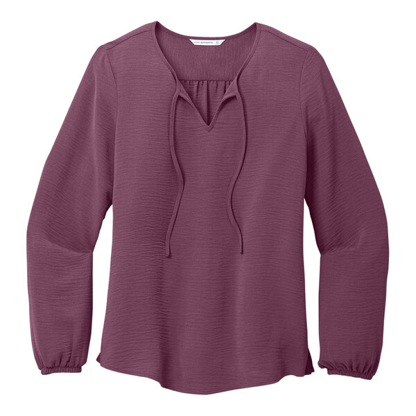 A purple Port Authority short sleeve blouse.