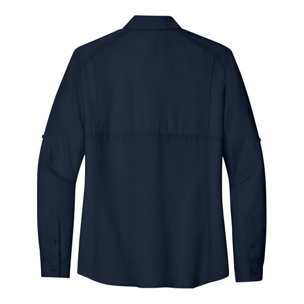 A navy short sleeve Port Authority shirt.