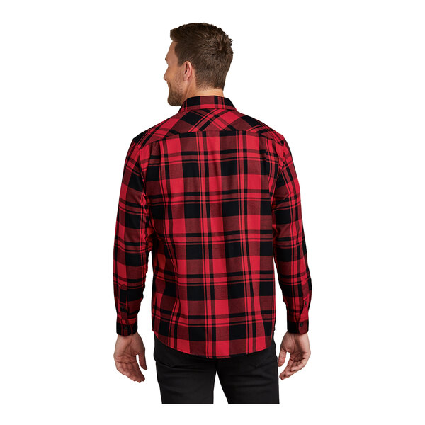A man wearing a Port Authority red and black plaid flannel shirt.