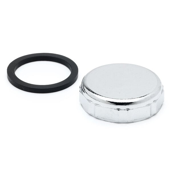 A silver metal T&S overflow cap with a rubber seal.
