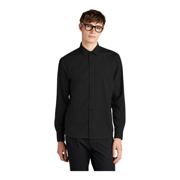 A man wearing a Mercer+Mettle black dress shirt.