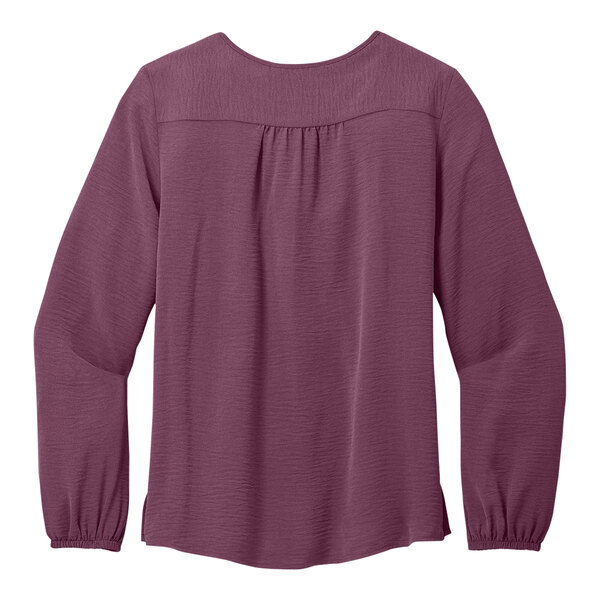 A purple Port Authority blouse with short sleeves.