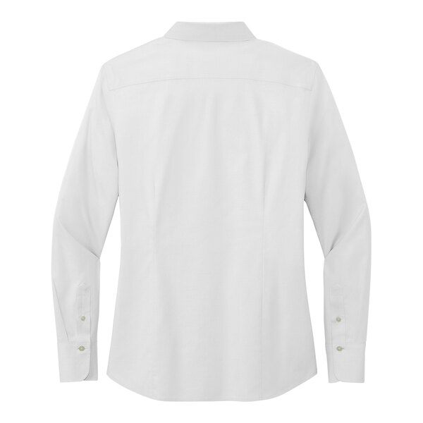 A Brooks Brothers white pinpoint stretch dress shirt with long sleeves.