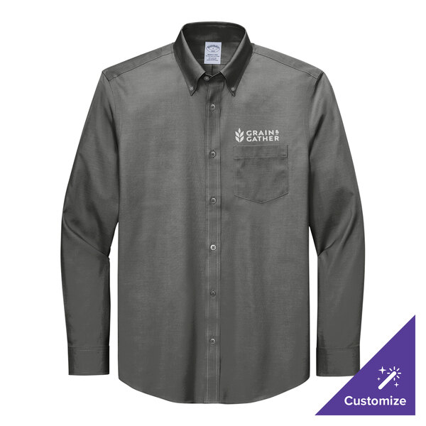 A long sleeved Brooks Brothers deep black pinpoint dress shirt with a logo on it.