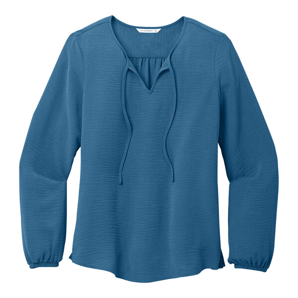 A Port Authority short sleeve blouse in Aegean blue.