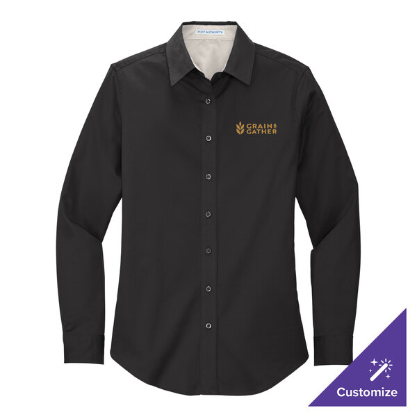 A black Port Authority long sleeve dress shirt with gold embroidery on the cuffs.