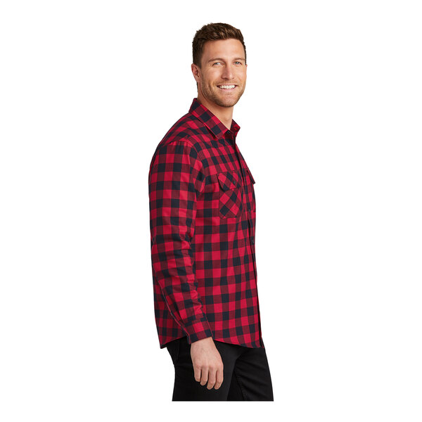 A man wearing a red and black Port Authority buffalo check flannel shirt.