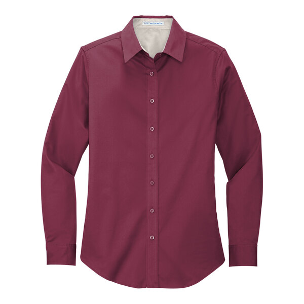 A Port Authority burgundy long sleeve dress shirt for women in a white background.