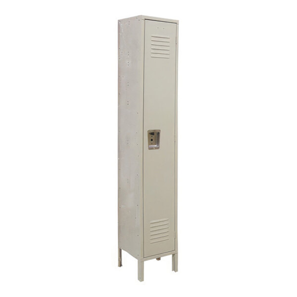 A tall, narrow beige metal locker with a single door, ventilation slots, and a recessed handle, standing on four legs.