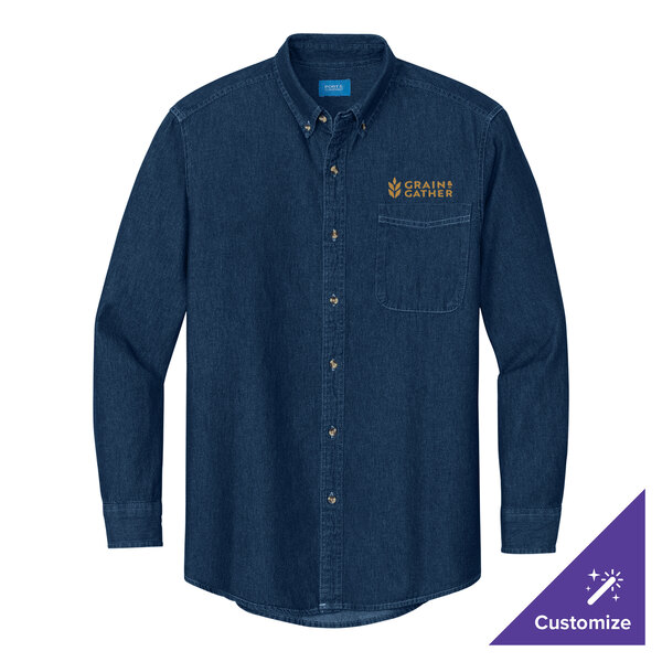 A Port & Company long sleeved denim shirt in blue with an embroidered logo.