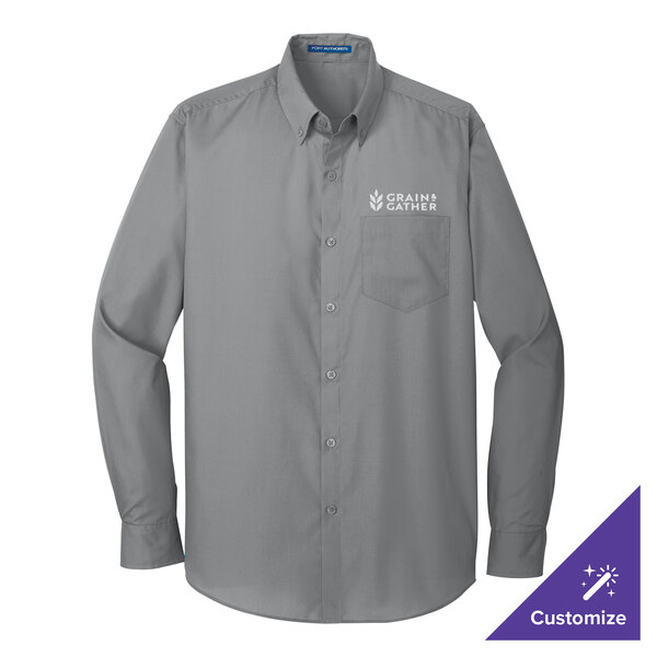 A long sleeved grey button up shirt.