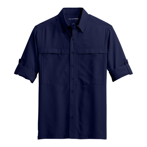 A Port Authority navy blue long sleeve shirt.