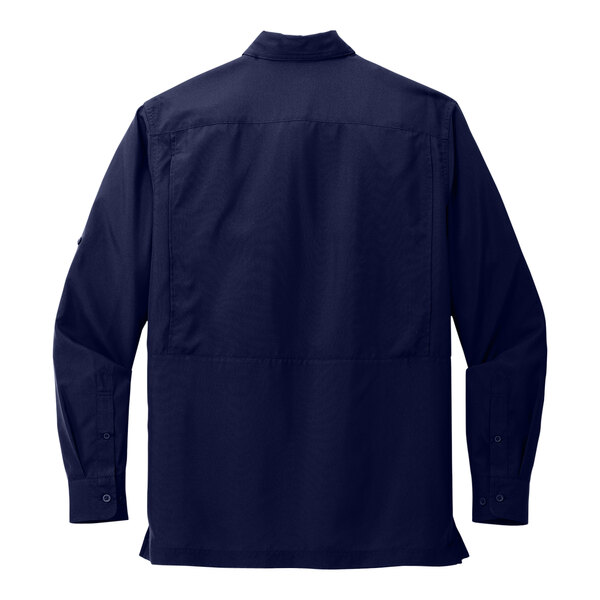 A back view of a navy blue Port Authority long sleeve shirt.