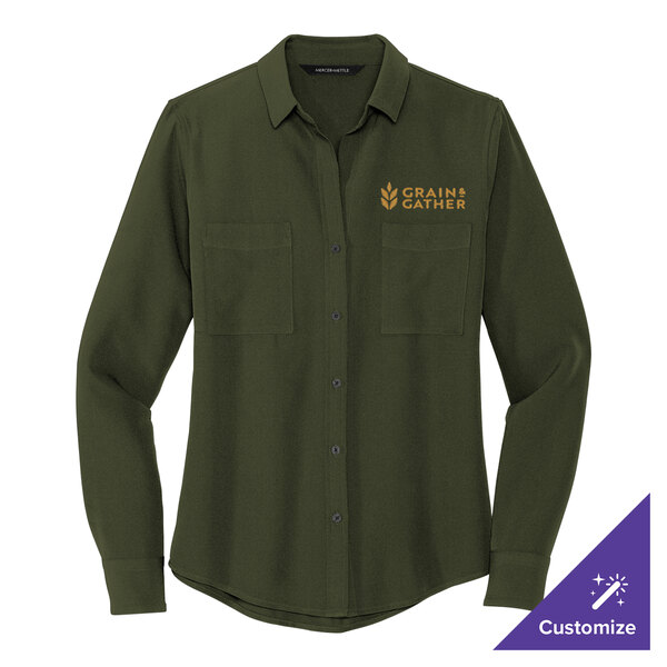 A Mercer+Mettle women's long sleeve green blouse on a restaurant counter.