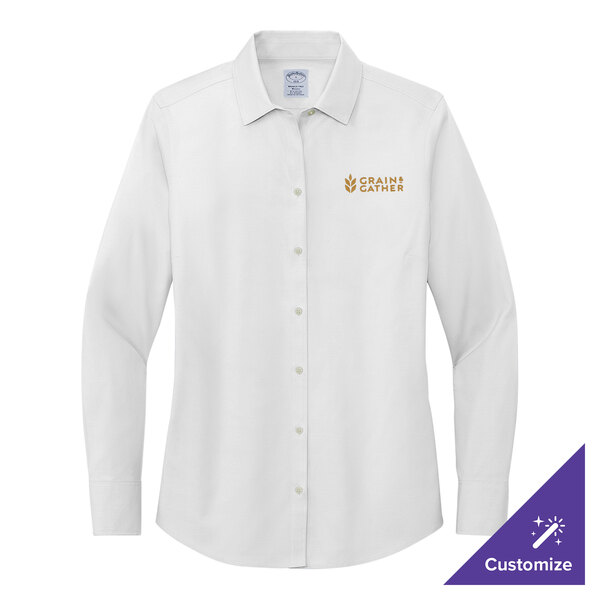 A white Brooks Brothers long sleeve dress shirt for women.