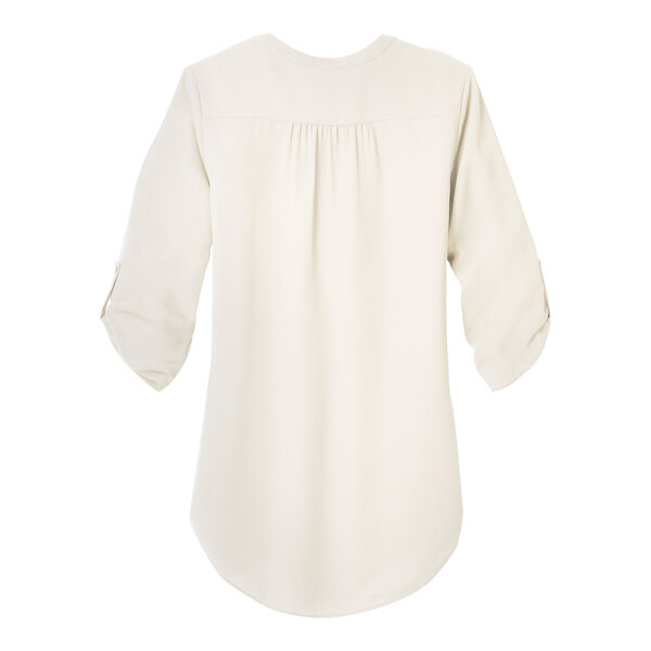 A back view of an ivory chiffon Port Authority blouse with ruffles.