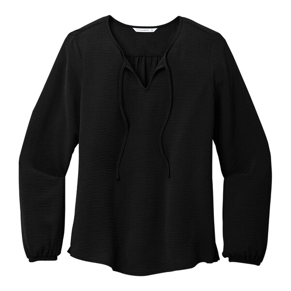 A Port Authority deep black short sleeve blouse.