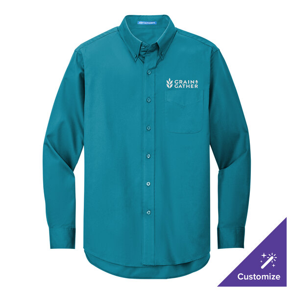 A small teal Port Authority long sleeve dress shirt with a logo.