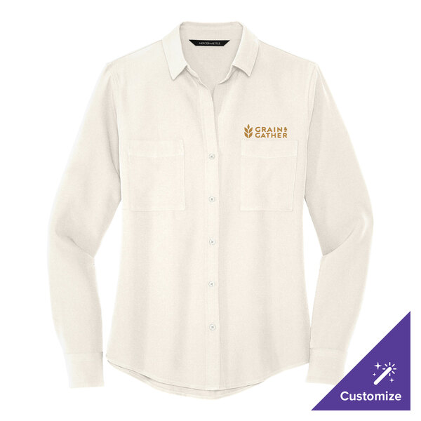 A white long sleeved Mercer+Mettle chiffon camp blouse.