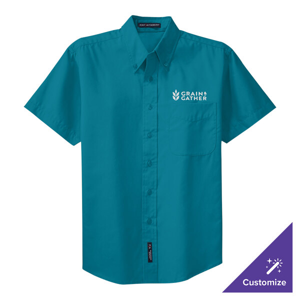 A teal Port Authority button-up dress shirt with white text on the front.