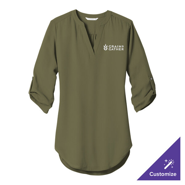 A Port Authority women's deep olive tunic blouse with white logo text on the front.