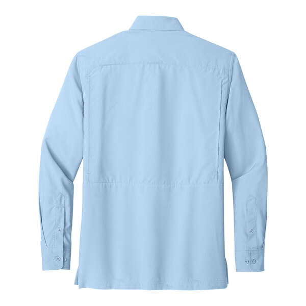 A back view of a Port Authority light blue long sleeve shirt.