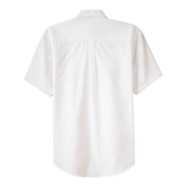 The back of a white Port Authority short sleeve dress shirt on a hanger.