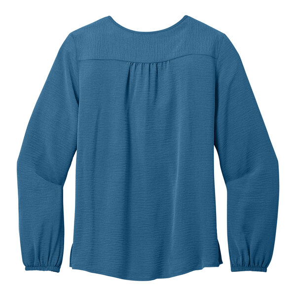 A blue short sleeve Port Authority blouse.
