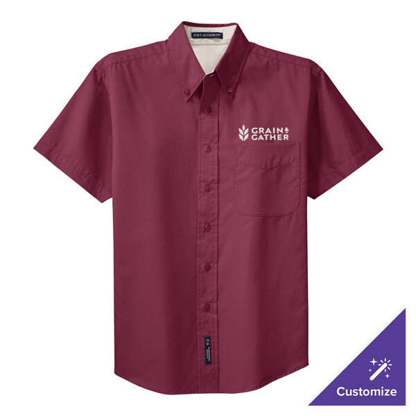 A Port Authority maroon and white short sleeve dress shirt.