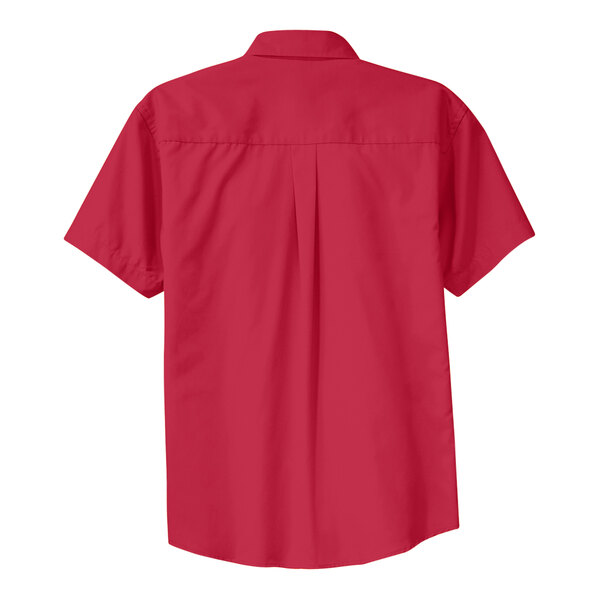 A red Port Authority short sleeve dress shirt with a light stone pattern on the cuffs and collar.