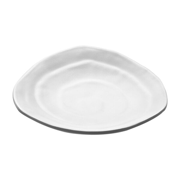 An Elite Global Solutions white melamine triangle plate with a curved edge.