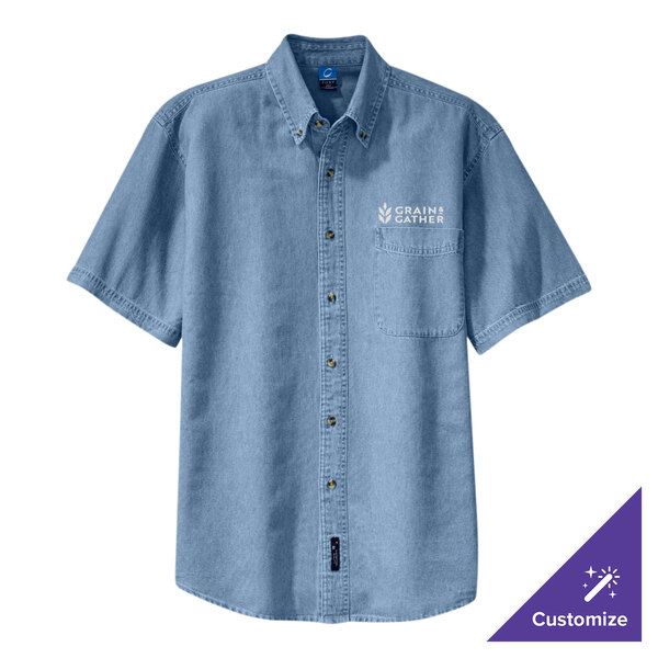 A Port & Company faded blue denim button-down shirt with an embroidered logo.