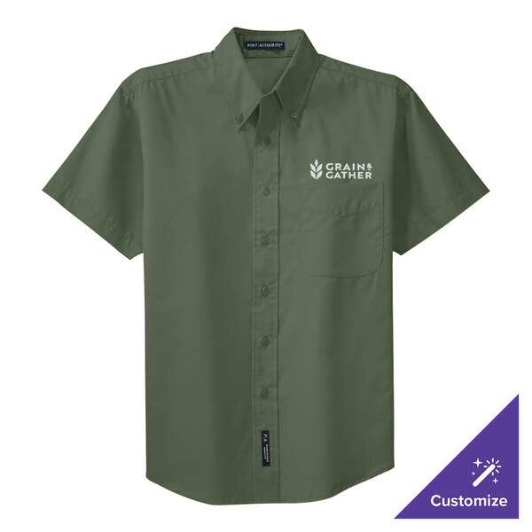 A Port Authority clover green short sleeve dress shirt with white text on a purple triangle.