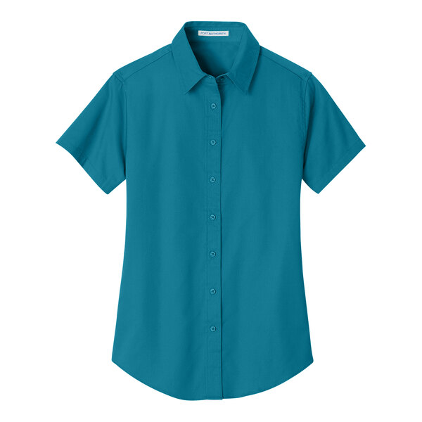A teal green Port Authority short sleeved button down dress shirt for women.