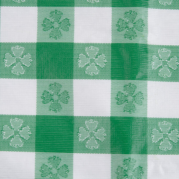 A green and white checkered vinyl table cover.