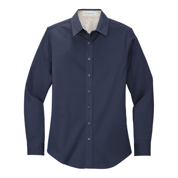 A Port Authority navy blue long sleeve dress shirt for women in a white background.