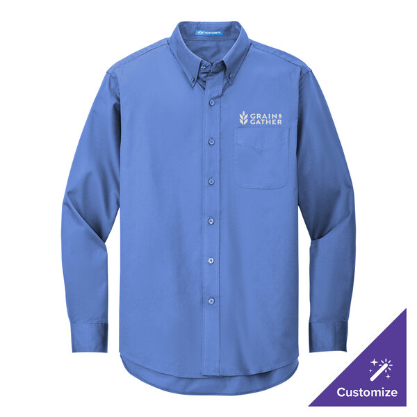 A Port Authority ultramarine blue long sleeve dress shirt.